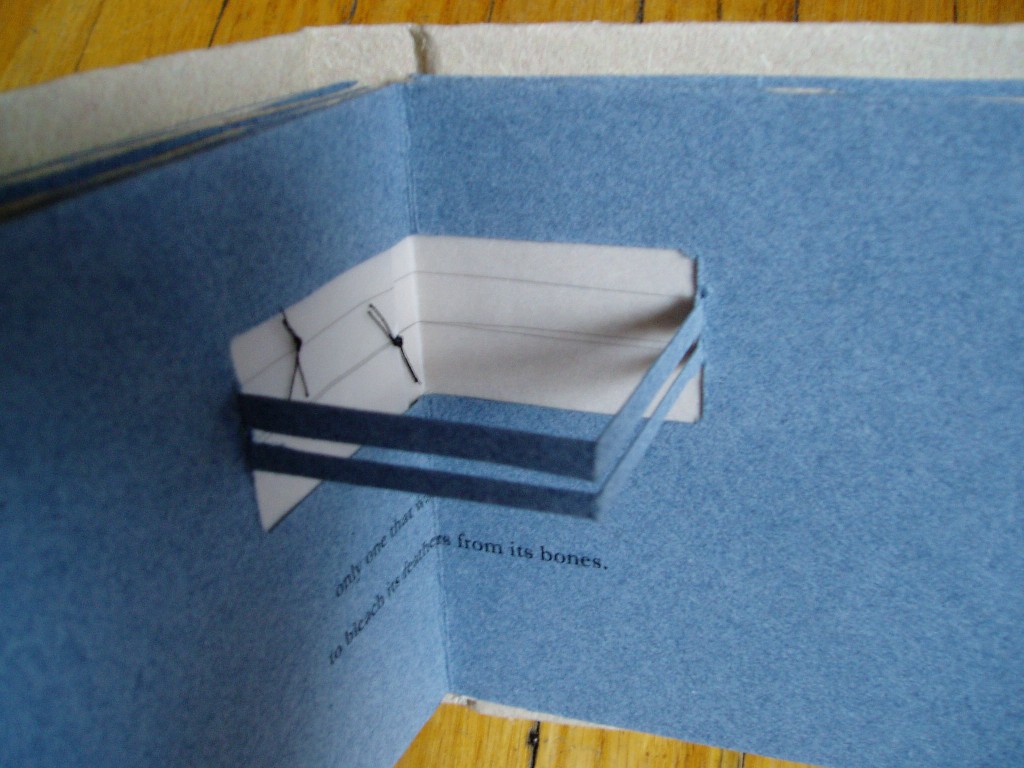 crows flank the highway, hand-bound by Lindsay Zier-Vogel
