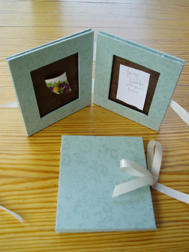 tea cup, hand-bound book by Lindsay Zier-Vogel